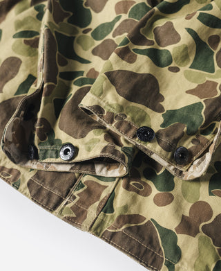 Camouflage jacket sleeve cuff with snap buttons and reinforced hem