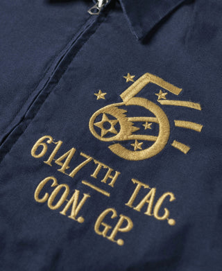 Navy tour jacket close-up of gold embroidered “6147th TAG. CON. GP” and emblem