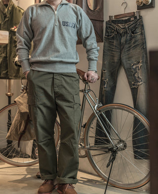 Gray half-zip sweatshirt with USAFA logo on chest, front view