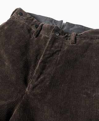 Brown corduroy pants with waistband, belt loops, and buttoned fly