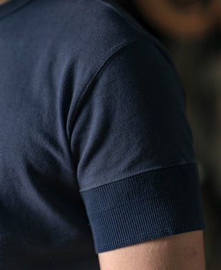 Navy short-sleeve henley t-shirt sleeve with ribbed knit cuff