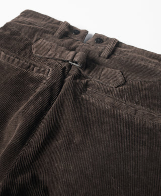 Brown corduroy pants with adjustable buckle on the waistband
