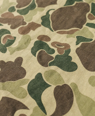 Camouflage jacket fabric with mottled pattern and textured weave