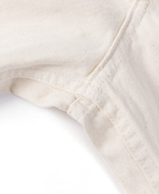 White herringbone deck pants close-up of side seam and fabric texture