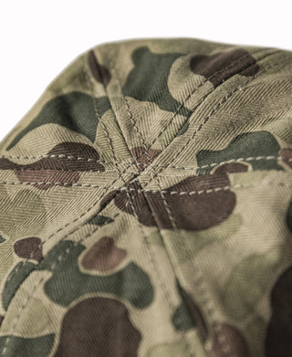Close-up of camo bucket hat crown stitching and patterned fabric