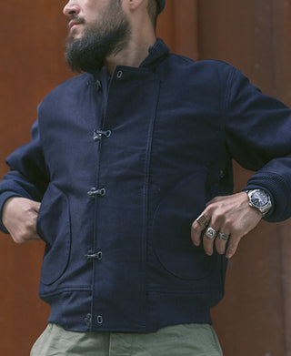 Navy deck hook jacket with hood, toggle front, and flap chest pockets