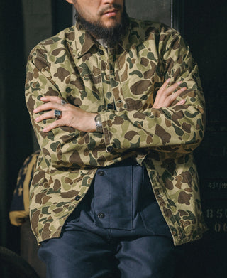 Camouflage button-front jacket with flap chest pockets, long sleeves