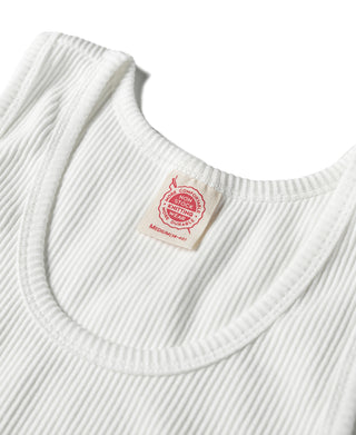 White ribbed tank top close-up of scoop neck and red size label