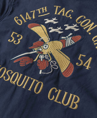 Navy tour jacket back embroidery with aircraft graphic and gold text patches.