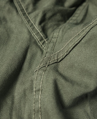 HBT jacket stitched placket seam with reinforced stitching, olive green.