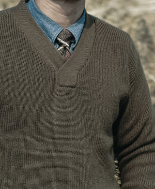 Olive V-neck sweater knit texture with collar placket detail