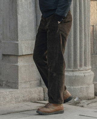 Dark brown corduroy work pants with straight leg and slanted back pocket.