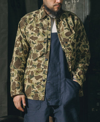 Camouflage button-front jacket with flap chest pockets and chest button detail