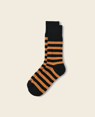Black and orange striped cotton crew socks, ribbed cuff and toe.