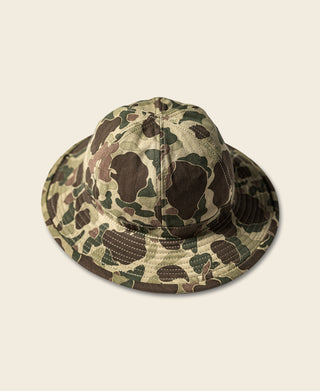 Camo bucket hat with curved brim and stitched crown panels