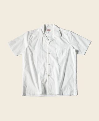 Ivory white open-collar short-sleeve shirt with front buttons and chest pocket