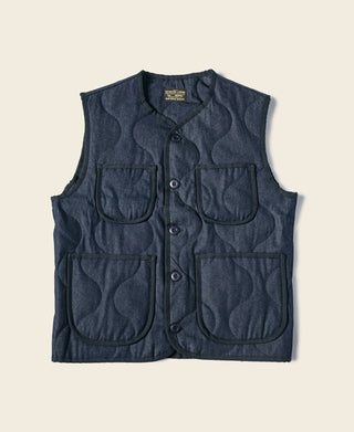 Navy quilted denim padded vest with button-front and two flap chest pockets