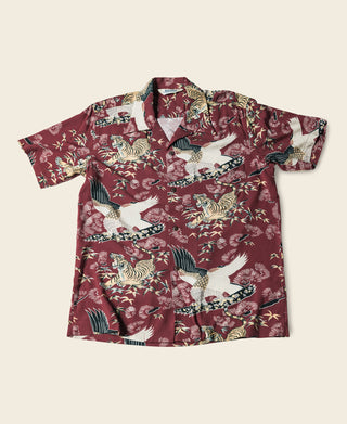 Wine red aloha shirt flat lay with tiger-and-crane ukiyo-e style pattern, short sleeves