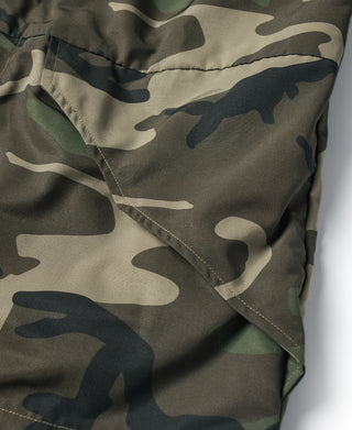 Camo parka hem with diagonal seam stitching and snap button flap