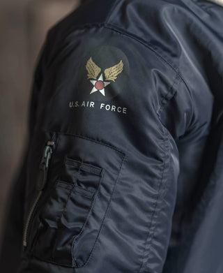 Navy flight jacket sleeve patch with U.S. AIR FORCE emblem and zip pocket