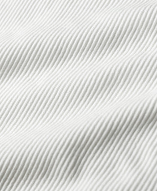 White cotton tank top, close-up of ribbed knit texture