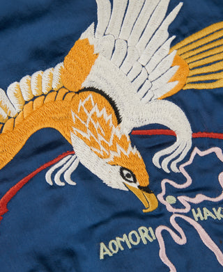 Reversible souvenir jacket, blue with embroidered bird, feathers, and wave details