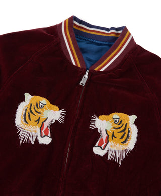 Reversible souvenir jacket, burgundy with zip front, striped collar, and tiger patches