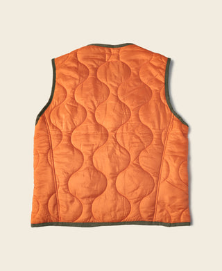 Orange quilted padded ripstop vest back view with dark trim and sleeveless cut