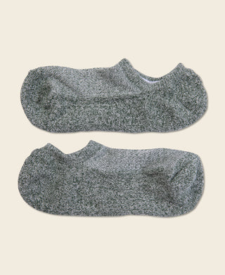 Pair of heather sage green no-show socks with low cut opening