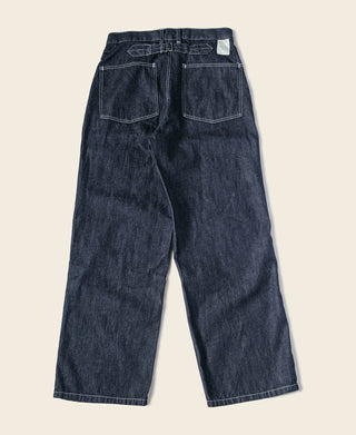 Indigo denim fatigue dungaree pants with two front patch pockets and belt loops