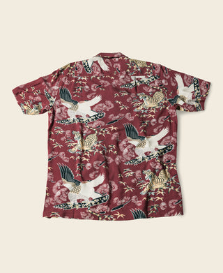 Wine red aloha shirt flat lay, back side with tiger-and-crane print
