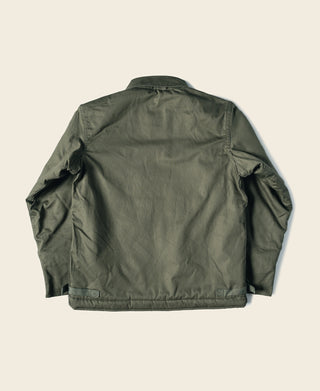 Olive deck jacket back view with button placket and side vented panels