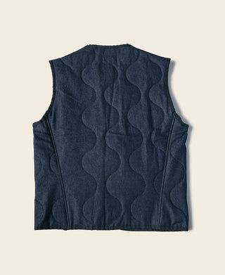 Navy quilted denim padded vest, sleeveless with button-front and layered pockets