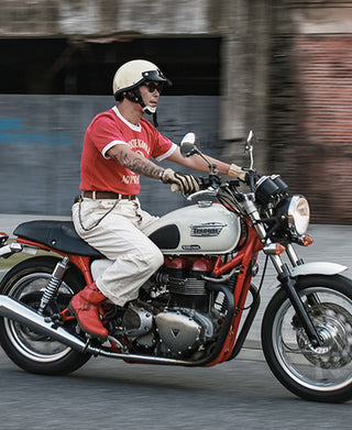 White herringbone deck pants on model, straight fit with front pockets and belt loops