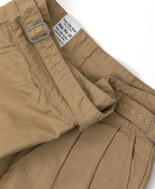 Khaki bermuda shorts with buttoned flap pockets and side belt loops