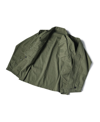 Olive green HBT jacket folded view showing button placket and shoulder yoke