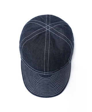 Indigo denim A-3 style cap with grid stitching and curved brim stripes on top