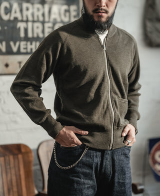 Olive wool zip-up sweater with ribbed cuffs and waistband