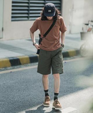 Olive bermuda shorts with side pockets and belt loops