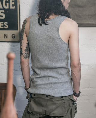 Gray cotton tank top on model, sleeveless back view