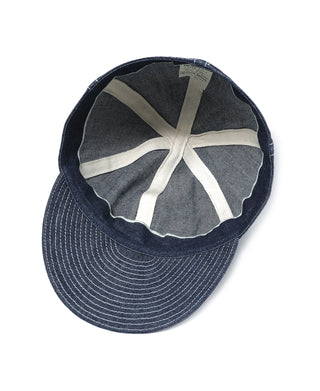 Indigo denim WWII A-3 style cap with stitched panels and cross patch on top