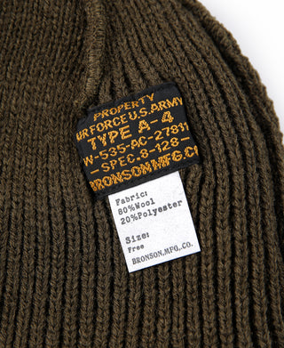 Olive rib-knit watch cap with interior fabric label patch