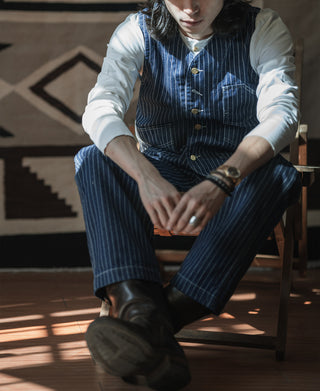 Indigo pinstripe work vest with five front buttons and chest pockets