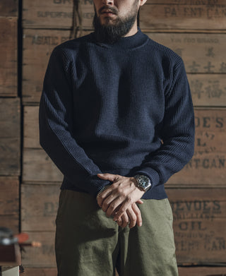 Men's navy crewneck wool sweater with ribbed hem and cuffs, long sleeves