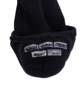 Black cotton no-show sock with gray grip logo at cuff