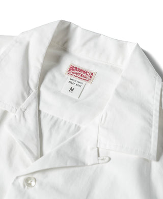 Ivory white open-collar shirt with size label on inner back neck