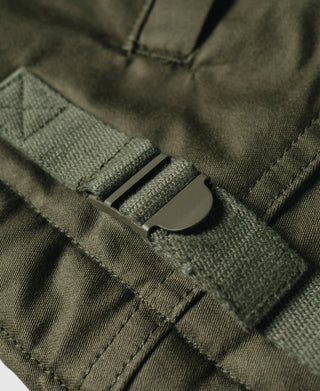 Olive deck jacket adjustable strap with metal buckle and snap closure