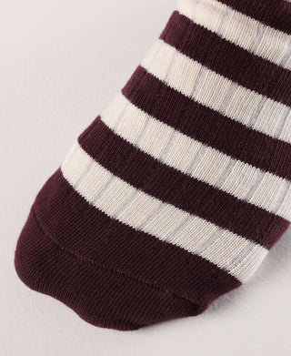 Close-up of burgundy and white striped cotton socks with rounded toe