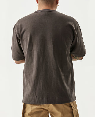Dark gray cotton pocket T-shirt, crew neck, back view with hem visible