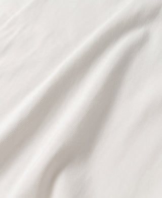 White cotton henley T-shirt fabric texture close-up